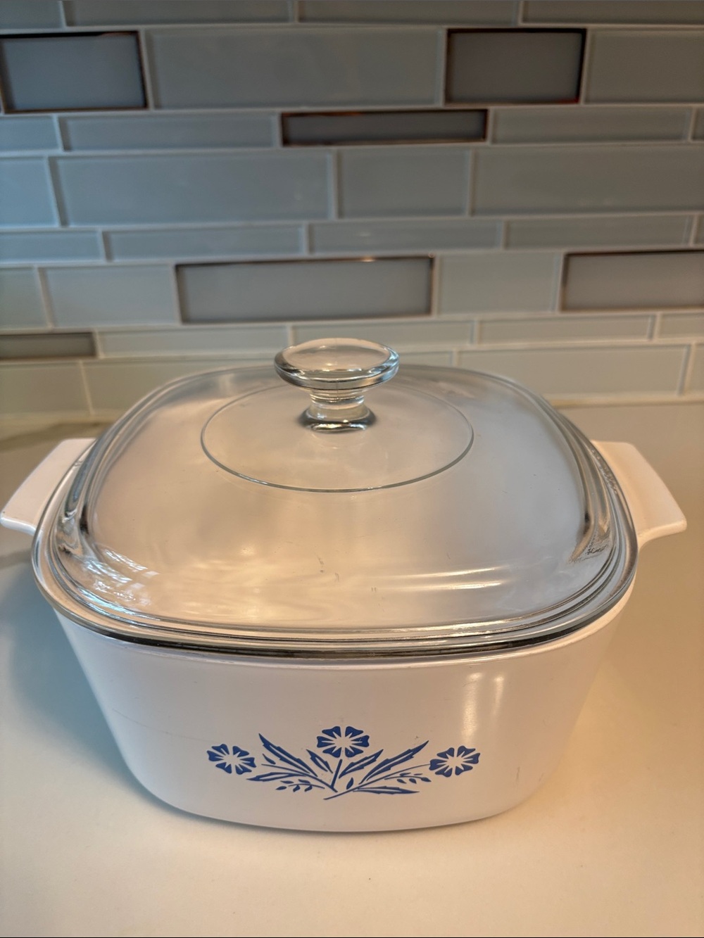 Vintage, 3 Liter Corningware White Casserole Dish with Blue Floral Pattern.